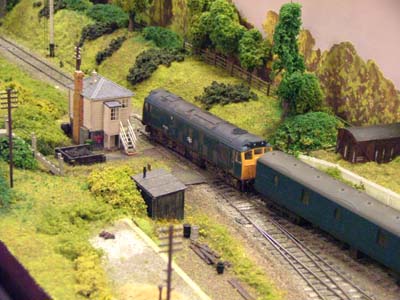 Class 25 departs Lapford Road